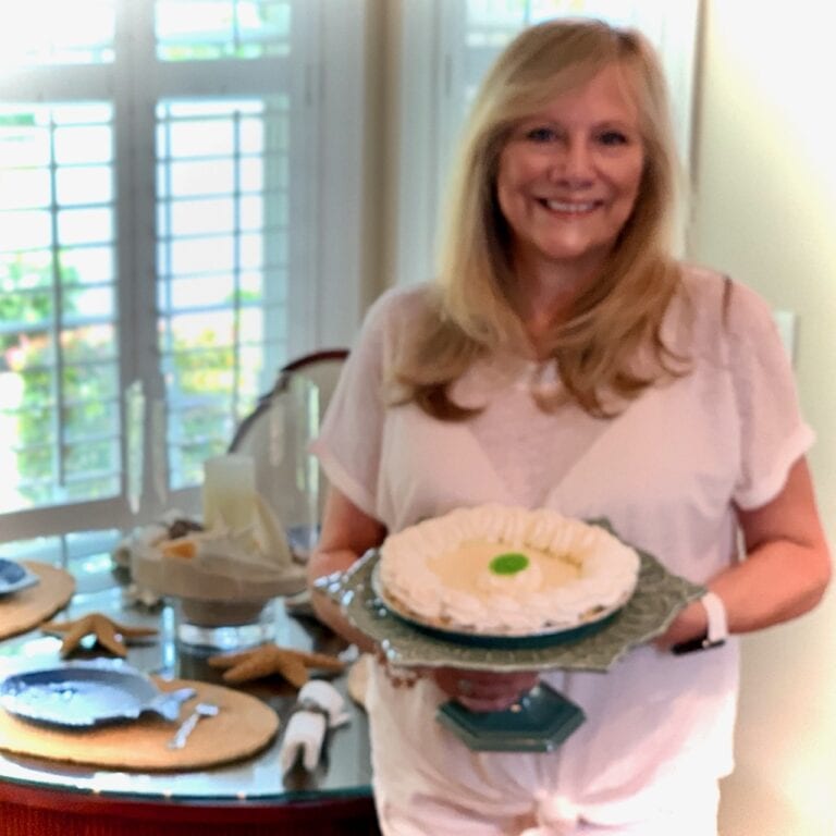 Woman serving Key Lime Pie a delicious Florida dessert!