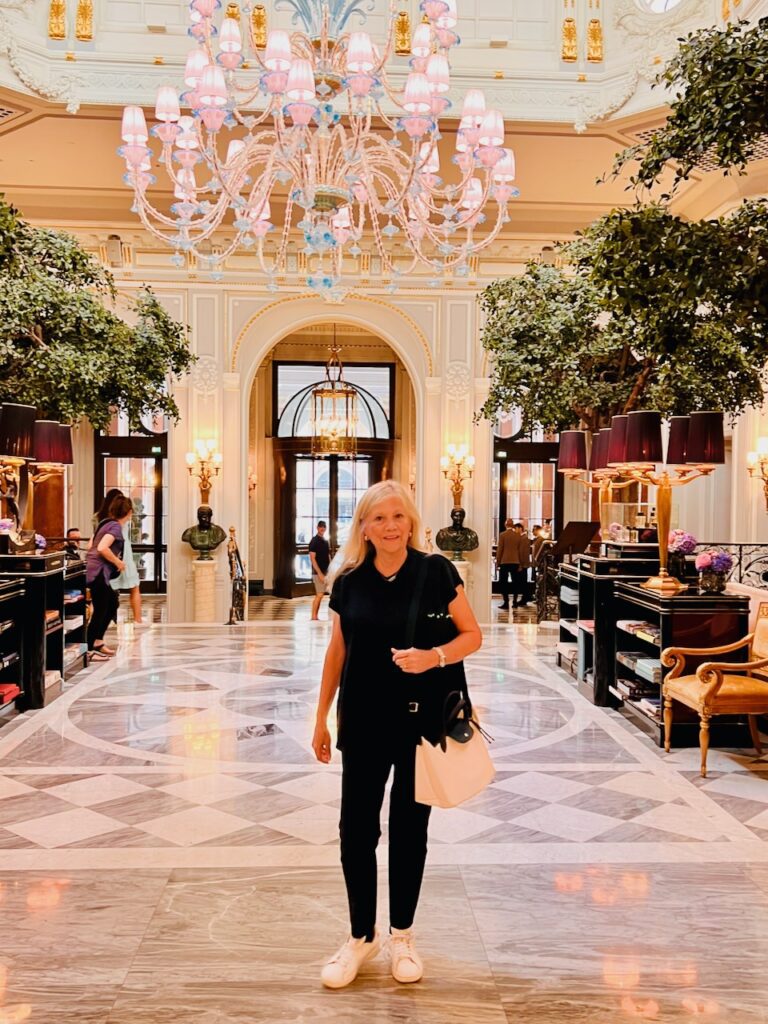 A woman arriving at the St. Regis Hotel in Rome, Italy
