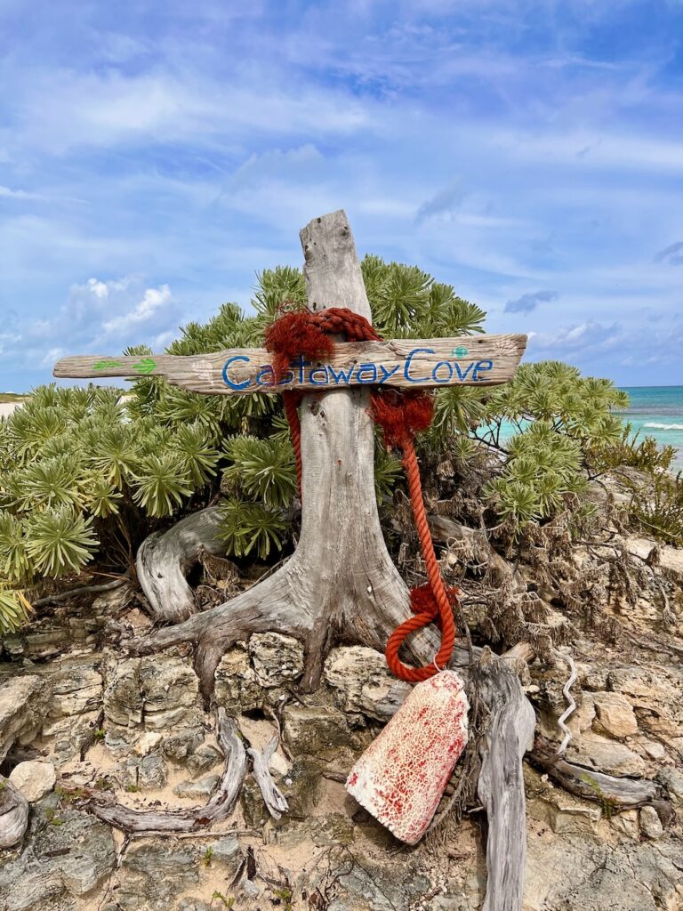 A make shift sign on a tropical island.