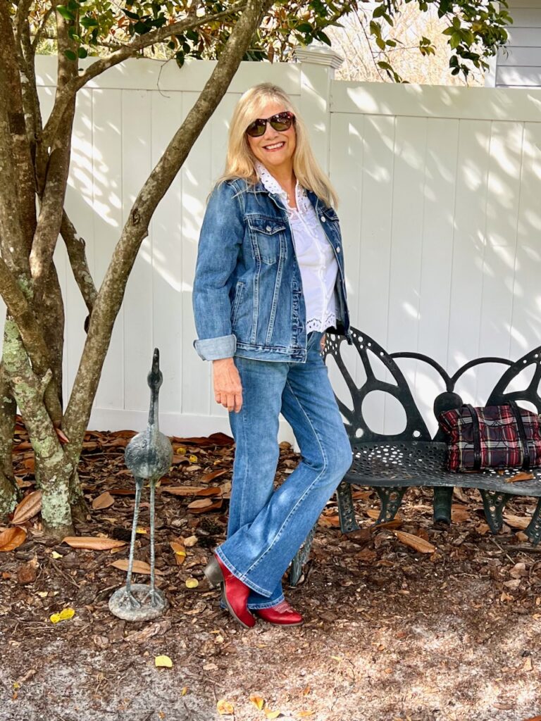 A blonde woman dressed in a denim outfit. How to layer fall fashion in Florida.