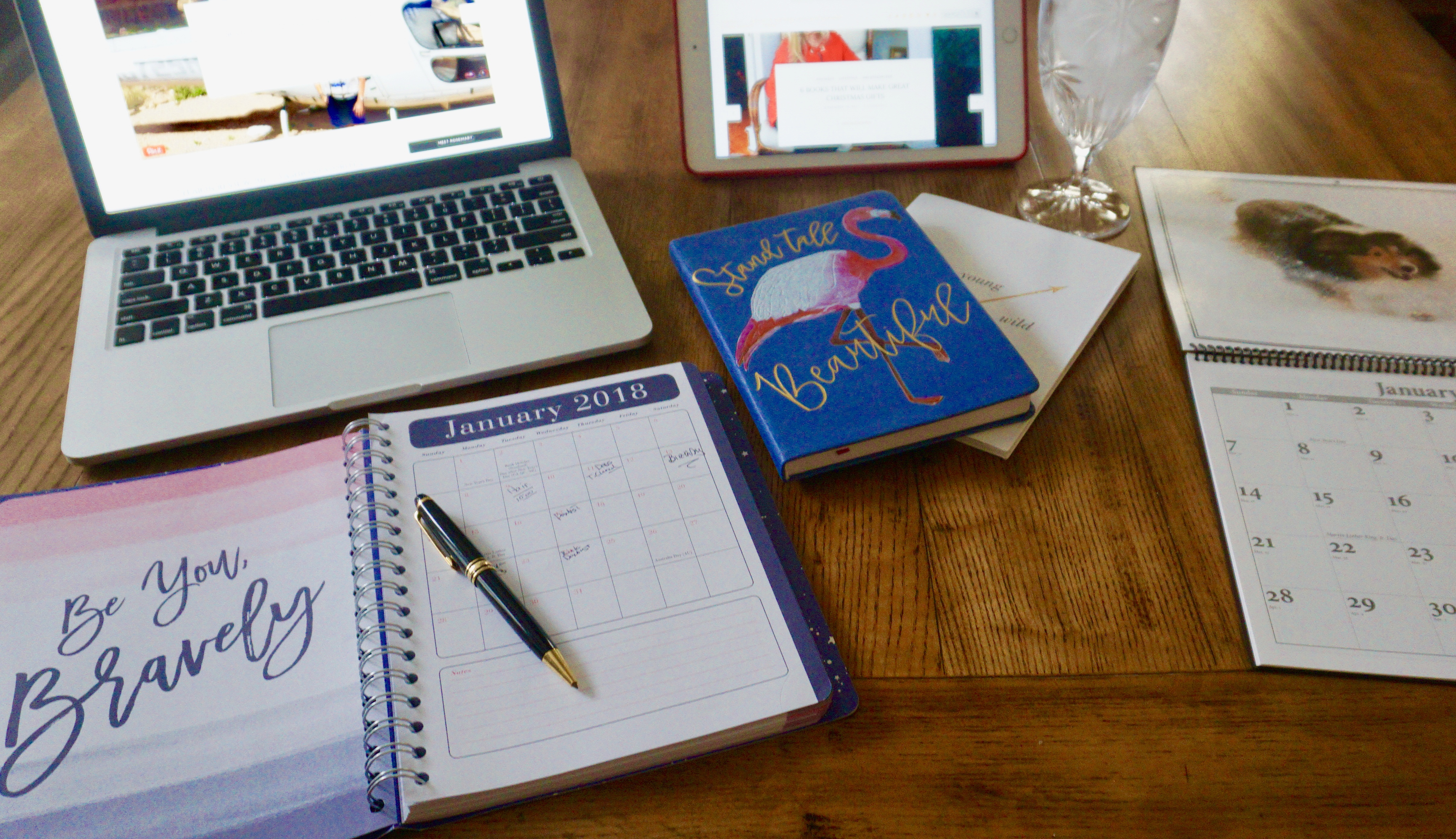 Desk with computer and planning materials