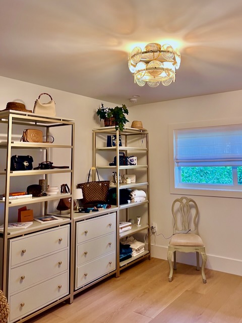 A lady's dressing room styled with modular shelves and cabinets.
